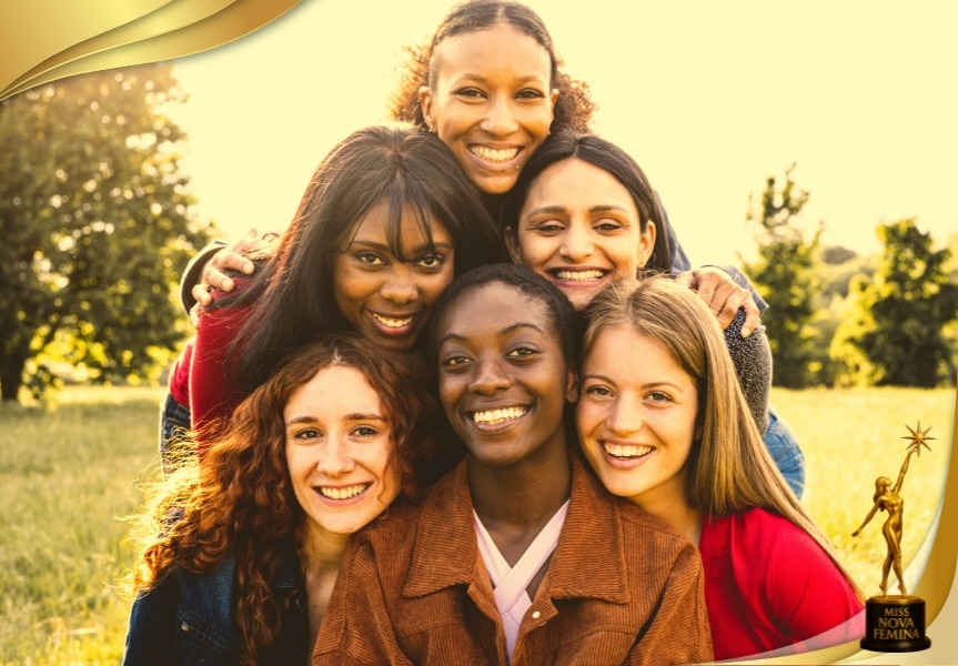 A diverse group of smiling women outdoors embracing each other, symbolizing unity, empowerment, and inclusion as represented by the Miss Nova Femina initiative.